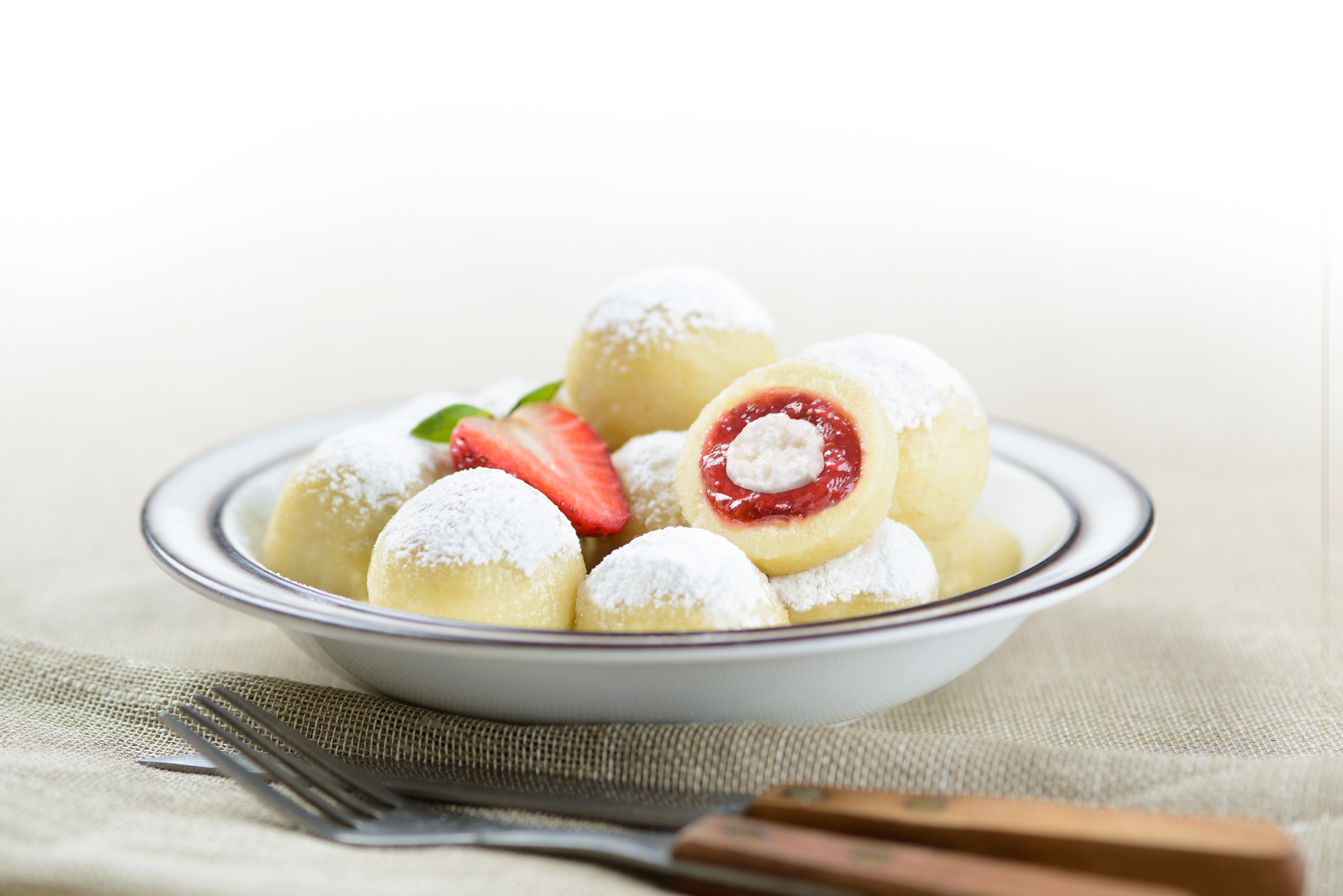 Dumplings with a strawberry and quark filling